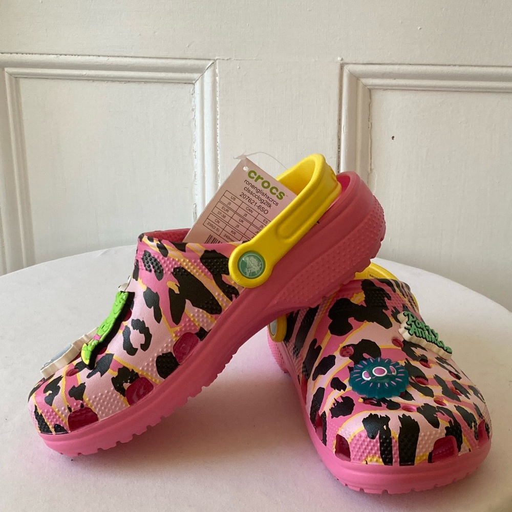 CROCS Kids' or adult Pink Animal Print Clogs sz J5